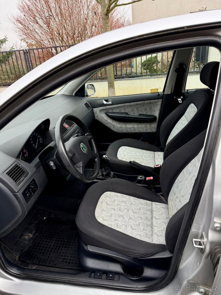 Škoda Fabia 1.4 klimatizace, parkovací senzory - 9