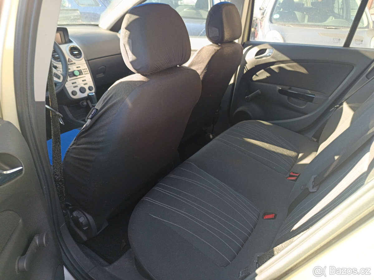 Opel Corsa D 1.2i - 9