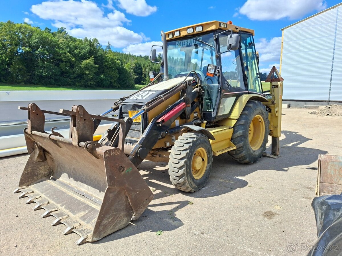 CATERPILLAR 428D 4X4 - 9
