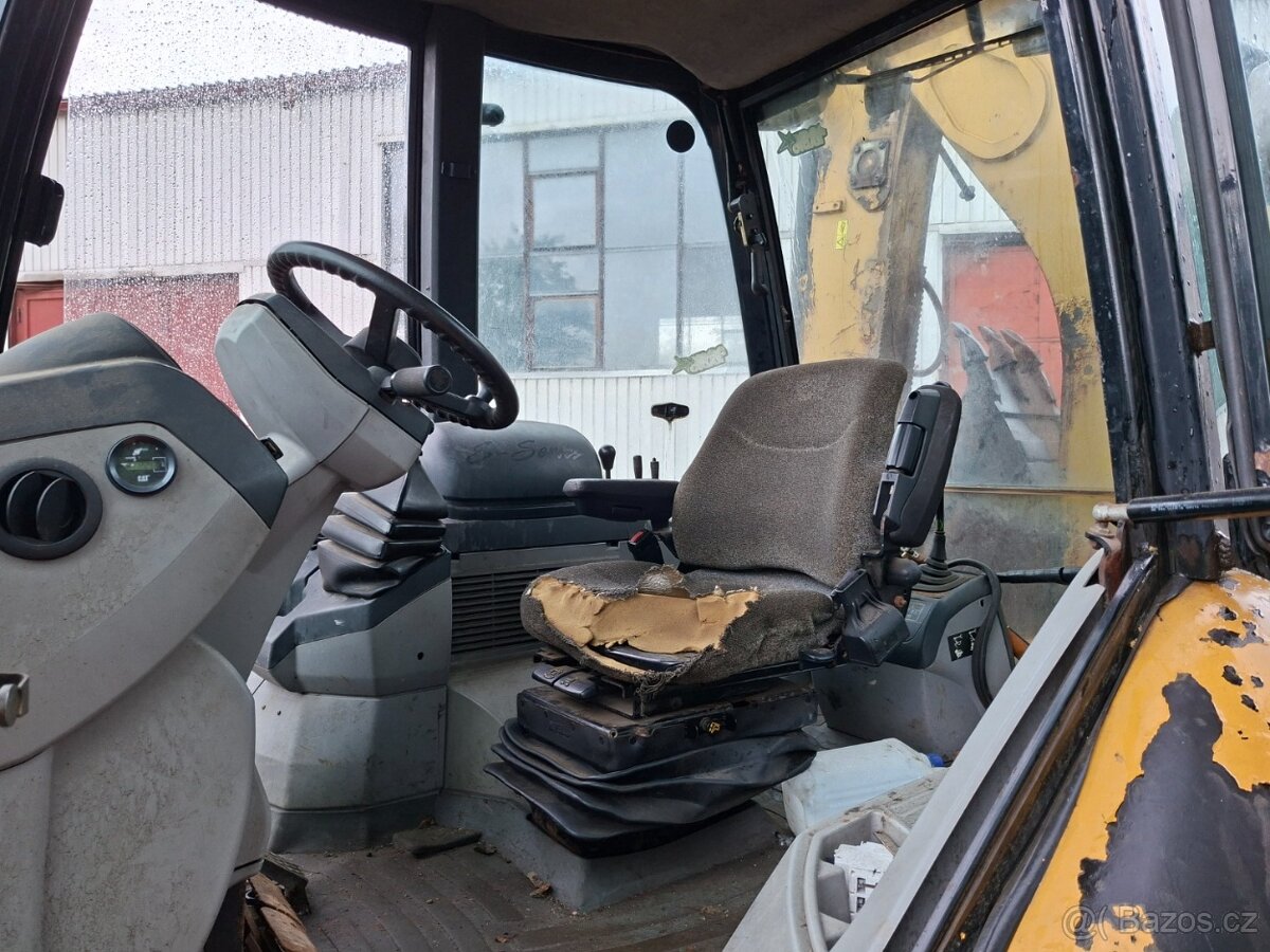 CATERPILLAR 428 E - 9