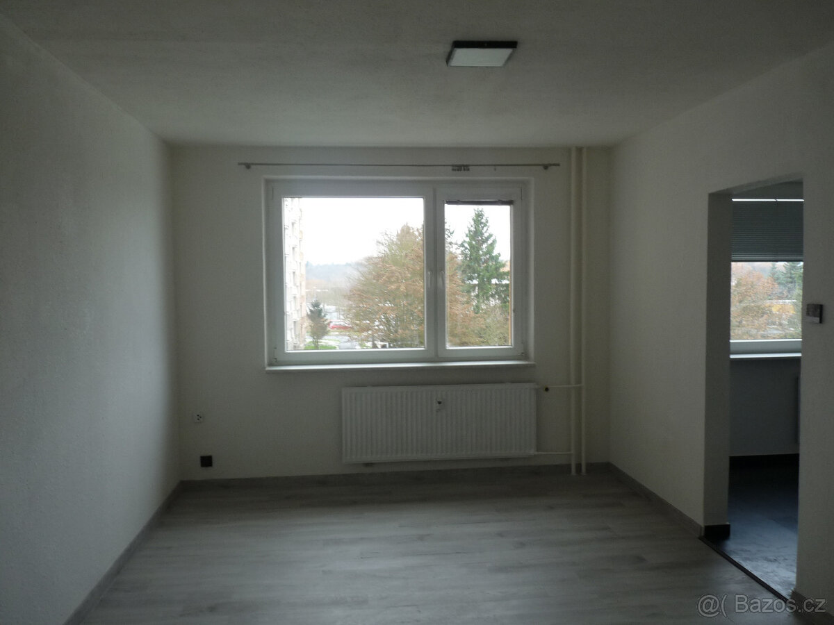 Pronájem kompletně zrekonstruovaného bytu 2+1 Spartakiádní 1 - 9
