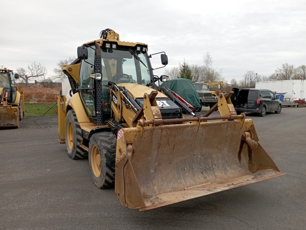 Prodám Caterpillar 428F - 9