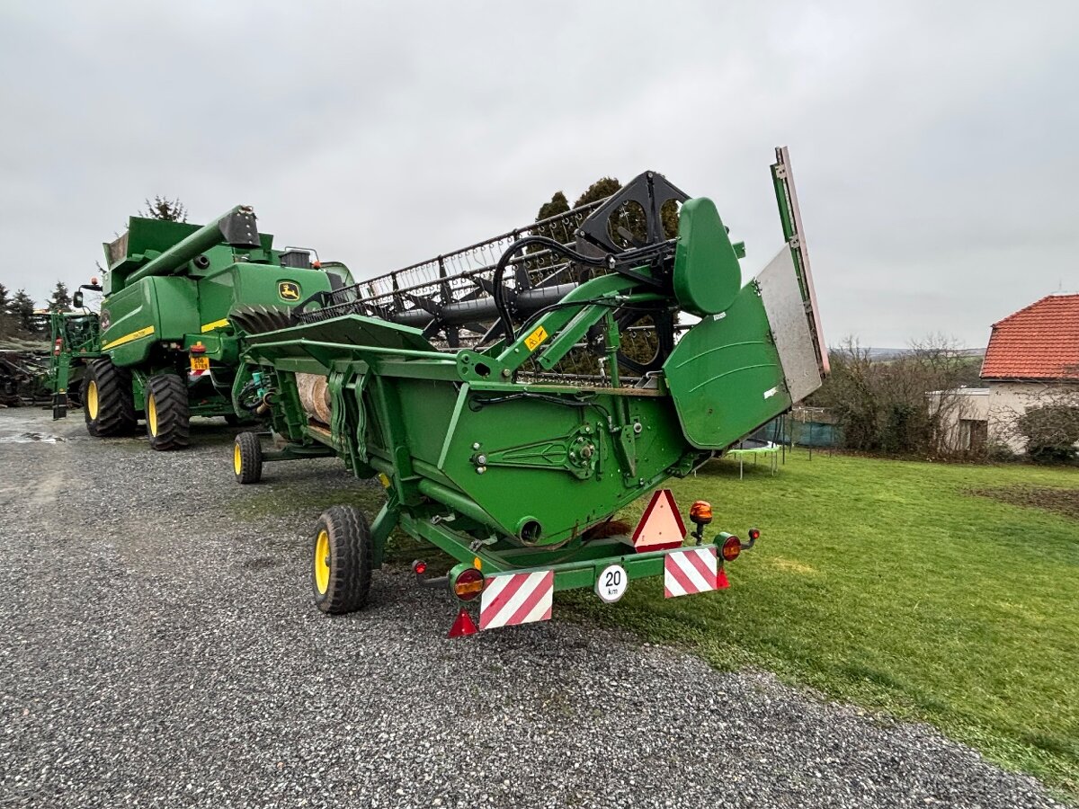 Prodám John deere t670 - 9