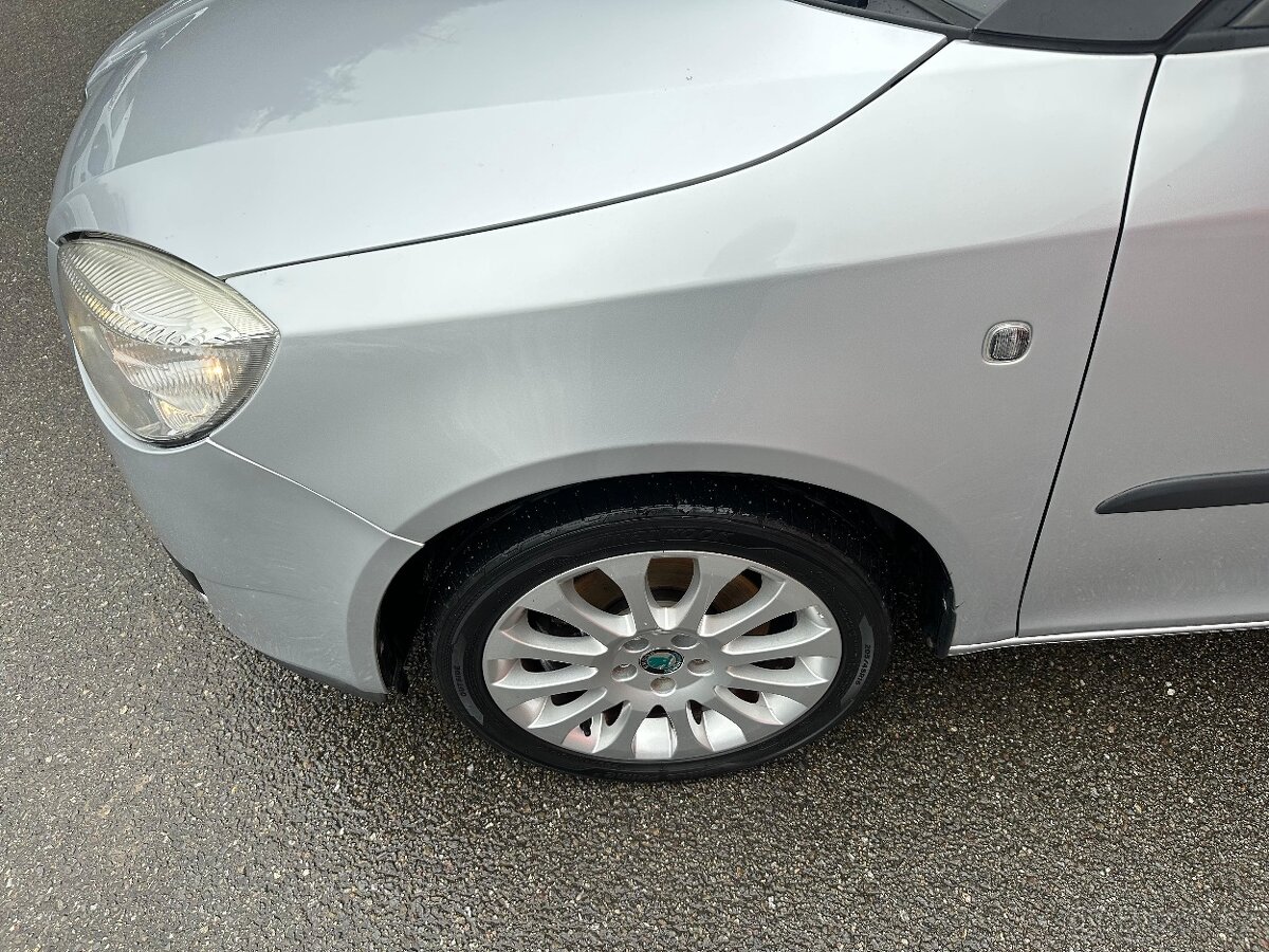 ŠKODA ROOMSTER 1.4TDi AMBITION - 9