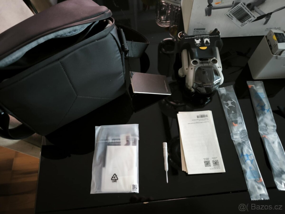 Dron DJI Mini 4 Pro Fly More Combo (DJI RC 2) + microSDXC 25 - 9