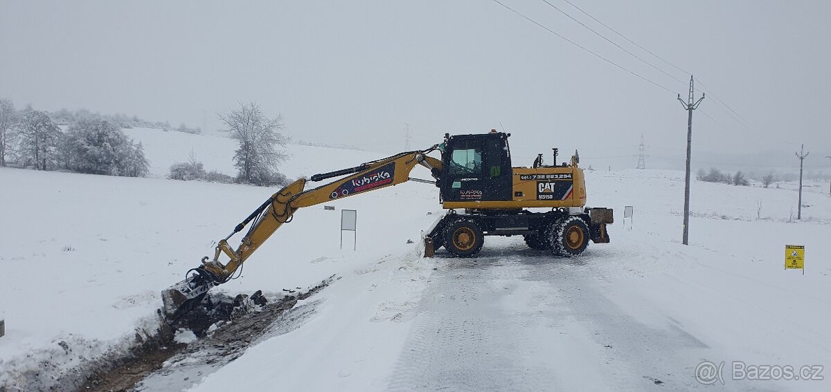 Kolový bagr Cat 315D - 9