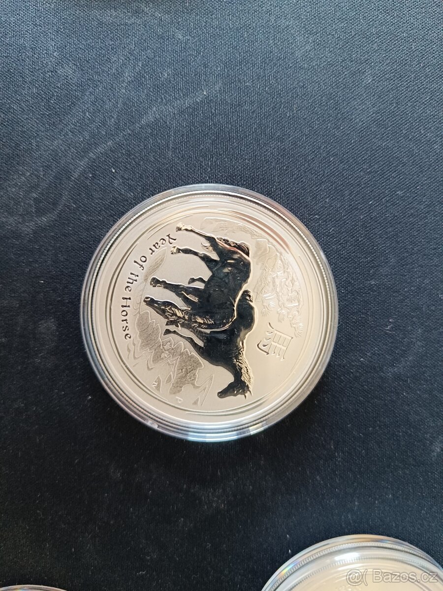 Sada 12 mincí Lunární série II. 1 Oz. Čisté stříbro. - 9