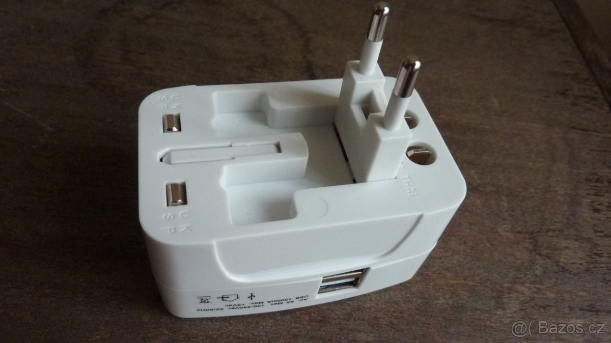 Cestovní univ. adaptér do elektrické sítě+ 2x USB - 9