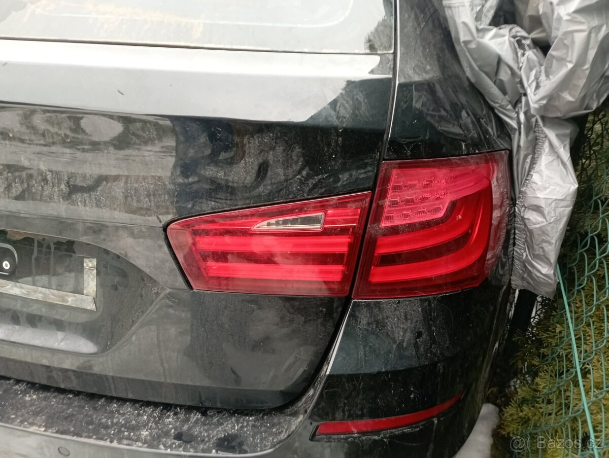 BMW F11 světlý kožený interiér - 9