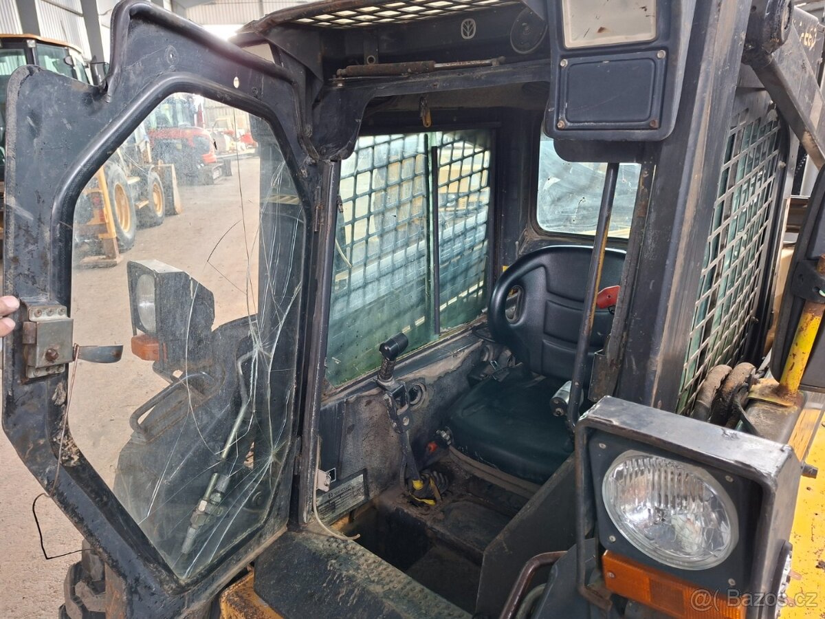 NEW HOLLAND LS 180 - 9