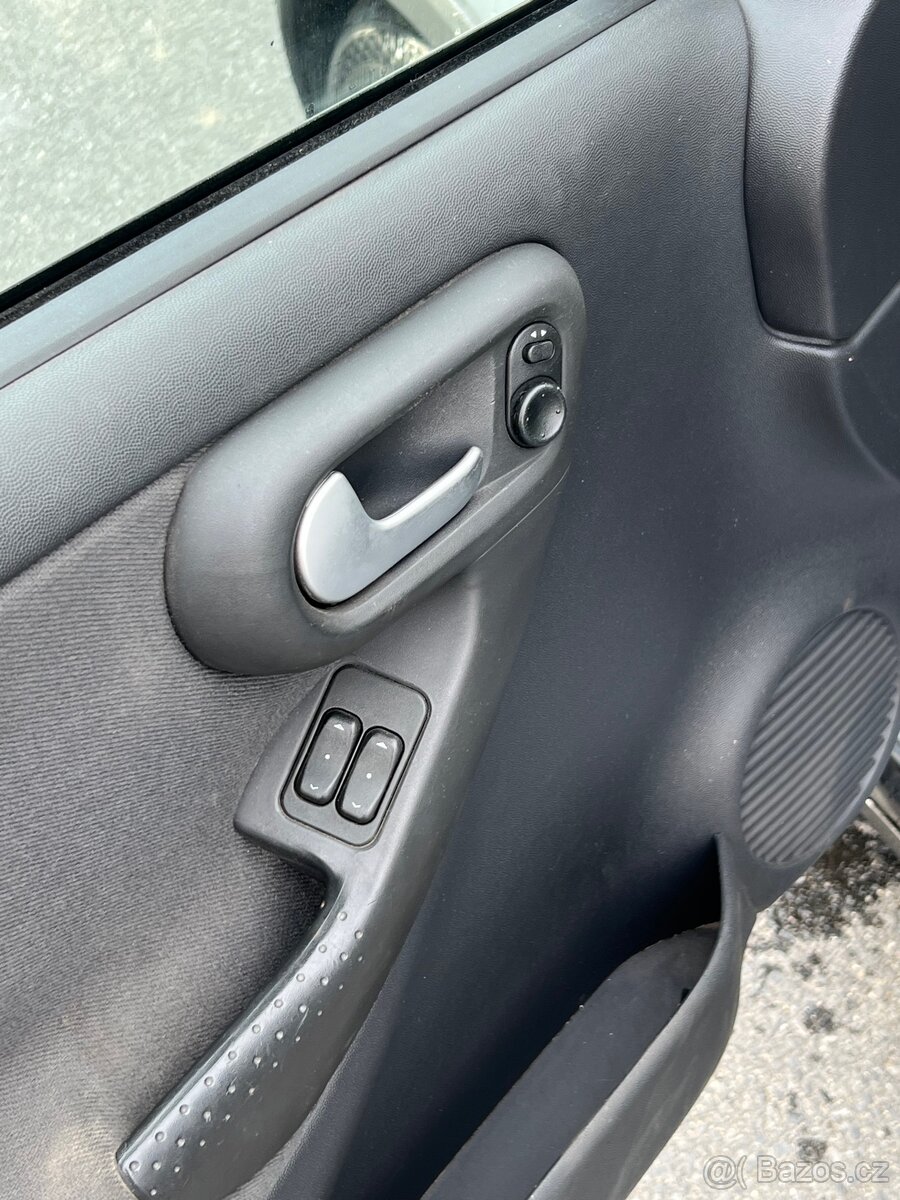 Opel Corsa 1.3dti - 9