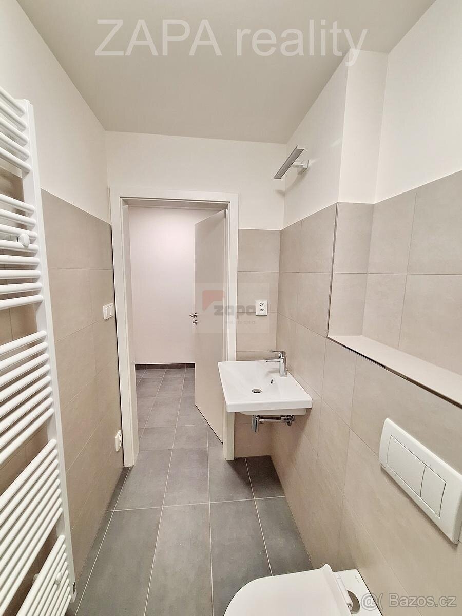 Pronájem 1+kk 31m2 + sklep 2m2 nezař. novostavba 4patro výt - 9