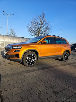 Roční Škoda Karoq 1.5 TSi Orange 8./24 - 9