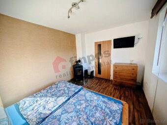 Pronájem vybaveného rodinného domu se zahradou v Hlušičkách - 9