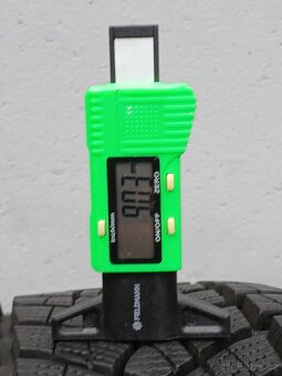 Zánovní zimní orig alu Škoda Karoq 215/50/18 vzorek 9mm - 9