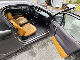 Tigra 1.4 16v r.v. 2000 - 9