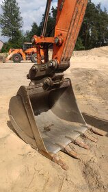 Pásový bagr Doosan DX140 - 9