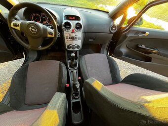 Opel Corsa D 1.2 - 9
