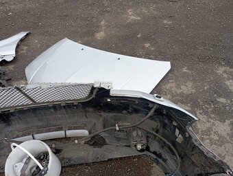 CHRYSLER GRAND VOYAGER V..PŘEDEK Z RV 2009 XENONY APOD. KO - 9