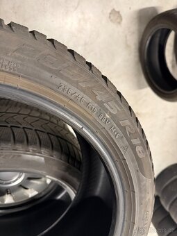 prodám zimní 235/45/18 Goodyear a Pirelli - - 9