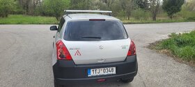 Suzuki Swift 1.3 - 9