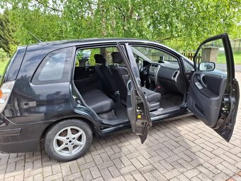 Prodám Suzuki Liana 1,6i , 4x4 , dovoz - 9