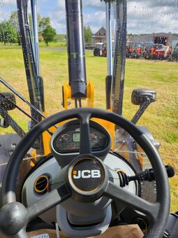 KLOUBOVÝ NAKLADAČ JCB 409 - 9