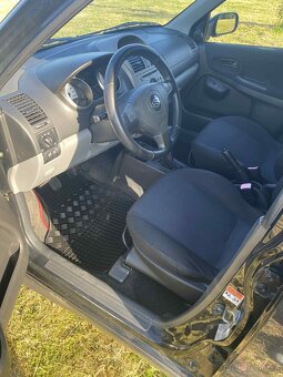 Suzuki ignis 1.5i 4x4 - 9