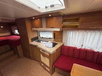 Knaus Royale 580 ~ Extra velká postel - 9