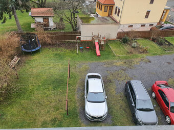 Prodej bytu 1+kk  v České Lípě, se zahradou a parkováním. - 9
