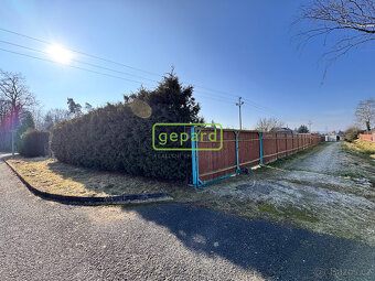 Prodej stavebního oploceného pozemku s projektem 1235m2 - 9