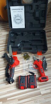 Aku zahradní set: řetěz.pila,nůžky,2xAku,nabíječka,kufr,TOP. - 9
