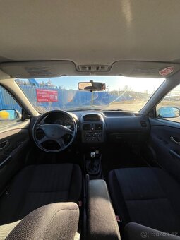 Mitsubishi Carisma 1.8GDI - 9