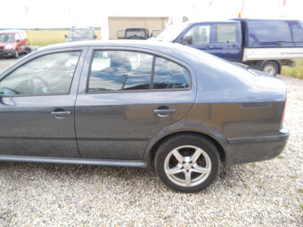 Škoda Octavia 1.9 TDi 74Kw TOUR - 9