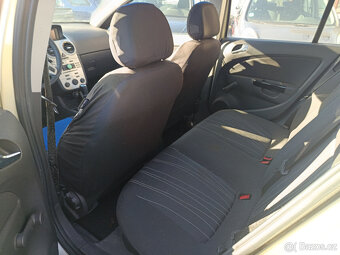 Opel Corsa D 1.2i - 9
