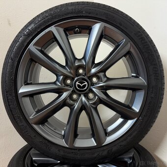 MAZDA 3 5x114,3 R18 ET45+LETNÍ 215/45R18 7,5mm - 9