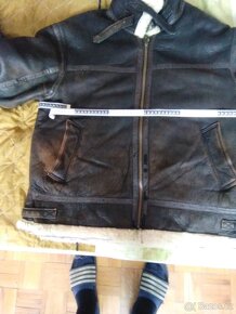 Prodám koženou bundu z kožíškem Zn.KARA - 9