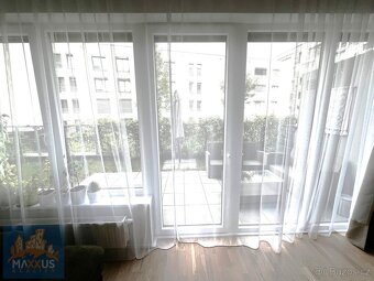 Pronájem moderního bytu 2+kk (56,6 m2) s předzahrádkou a ter - 9