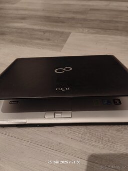 Fujitsu LifeBook S710, 14 palců - 9