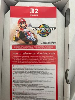 Nintendo Switch 2 + 4 hry , obal - 9