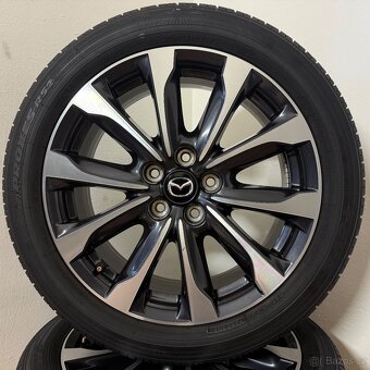MAZDA CX-3 5x114,3 R18 ET50+LETNÍ 215/50R18 6,5mm - 9