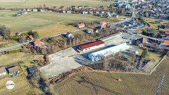 Výrobní, skladovací prostor na pozemku o výměře 12.774 m2 v - 9