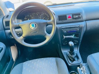ŠKODA OCTAVIA 1.6 i TOUR BENZÍN 75 kW KLIMA - 9