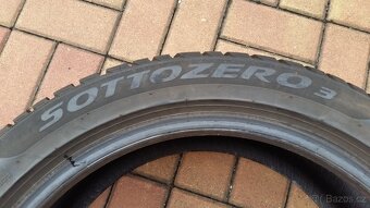 Zimní pneumatiky PIRELLI 245/45 R19 102V XL 4x7,5mm r.2023 - 9