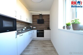 Pronájem novostavby bytu 2+kk s lodžií a parkovacím stáním v - 9