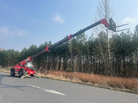 Teleskopický manipulátor, přeprava strojů - 9