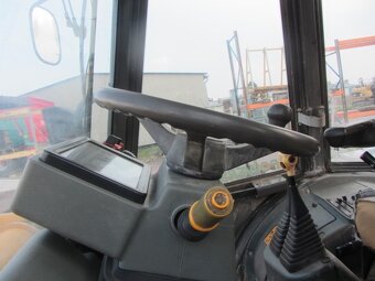 Kolový bagr JCB 4CX - 9