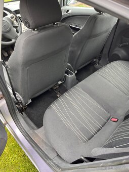 Opel Corsa D 1.2 16v - 9