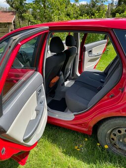 Kia Cerato, 1,6i, 77kW, r.v. 2006 - 9