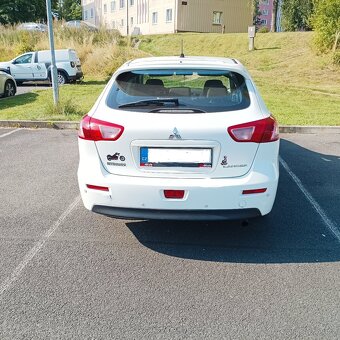 Mitsubishi Lancer 1.8 r.v. 2011 - 9